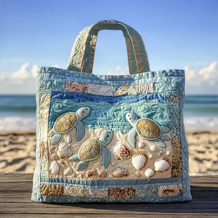 Tortues de mer sur la plage – Sac fourre-tout matelassé