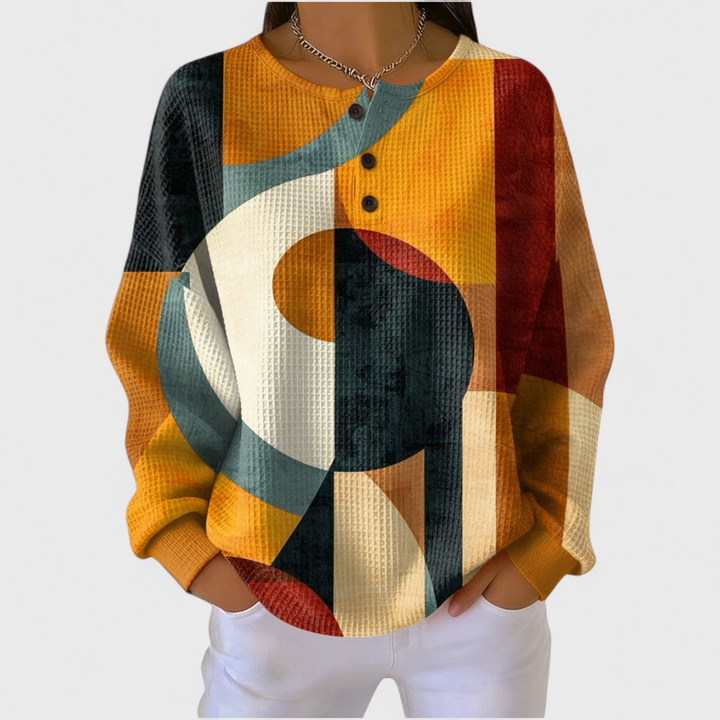 Sanne | Pull en matériau structuré avec motifs géométriques