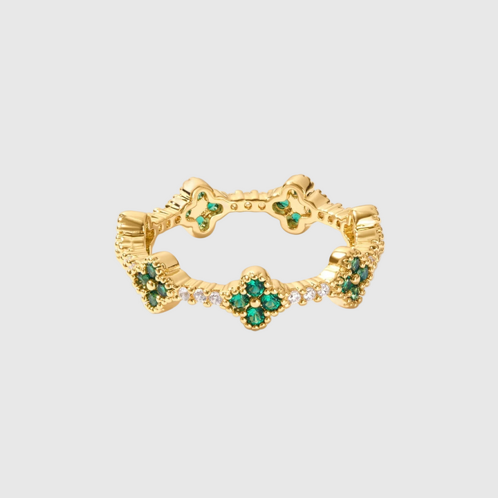 Annika – Bague raffinée avec finition dorée et pierre verte lumineuse