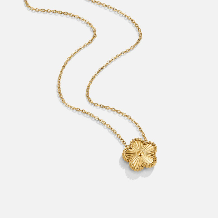Isabela – Collier rond en or avec un délicat pendentif