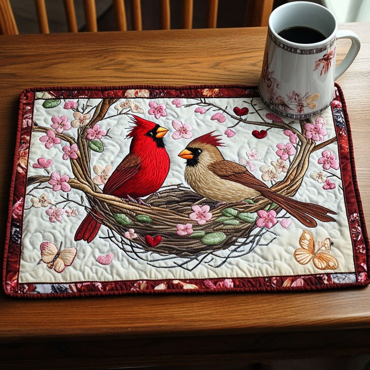 Cardinaux au nid fleuri – Napperons matelassés