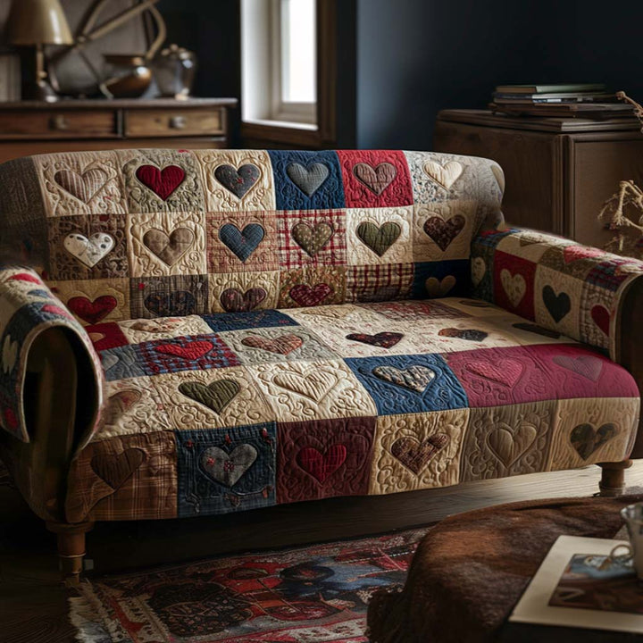 Cœurs en patchwork – Housse de canapé matelassée
