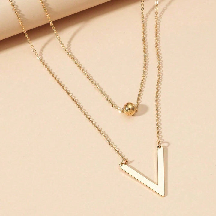 Vittoria – Collier à Double Couche avec Pendentif Géométrique